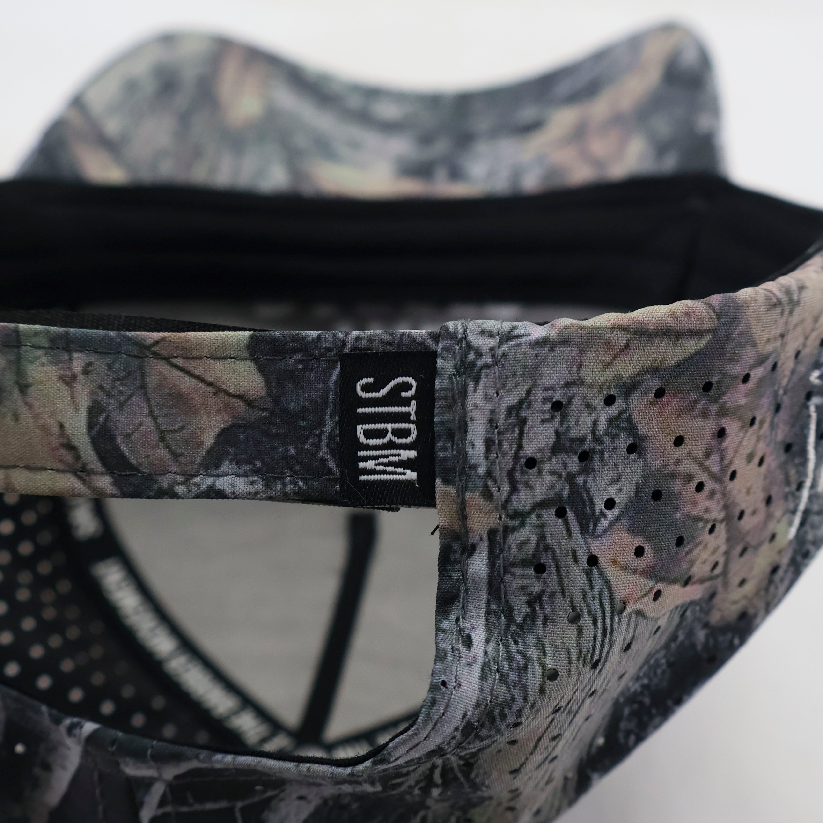SALUTE THE BARBER™ Premium Camo Performance Hat      Respect The Craft. Wear The Culture.