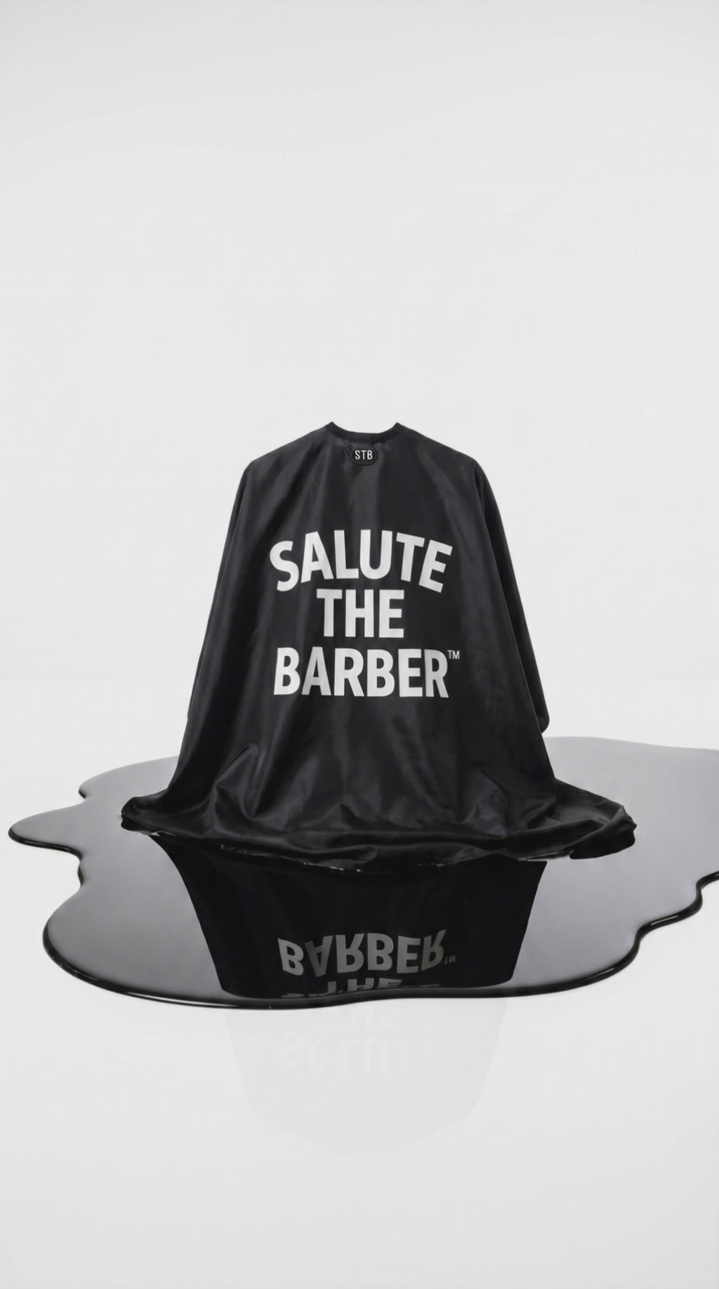 Professional Barber Cape
Built for daily shop use and designed for barbers who respect the craft.